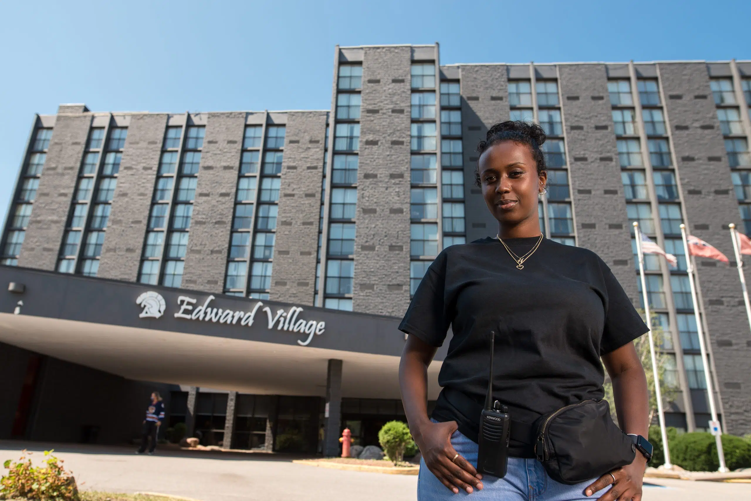 Fred Victor staff standing in front of Edward Village hotel